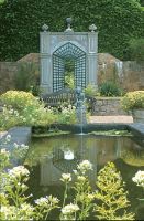Pond and statue in private garden
